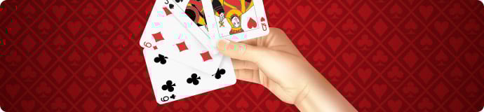 Playing cards in hand